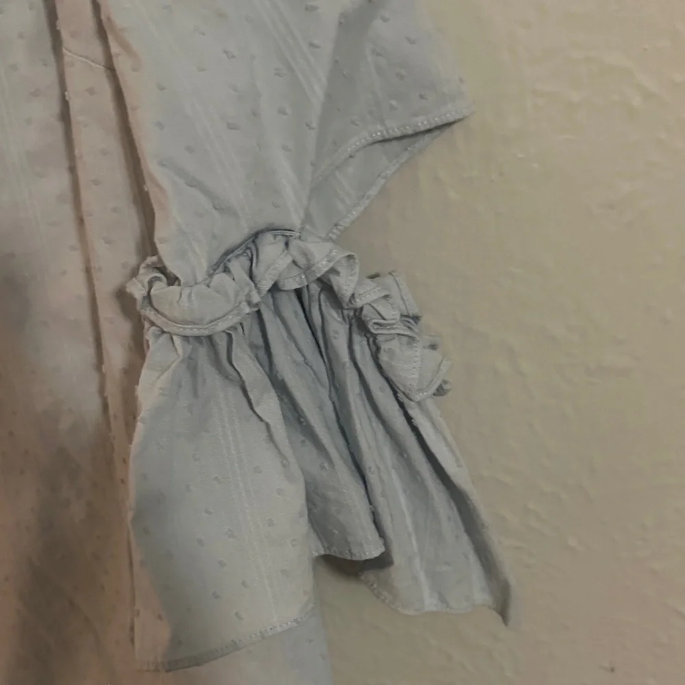 CeCe Light Blue Ruffle-Sleeve Textured Blouse - Picture 3 of 6